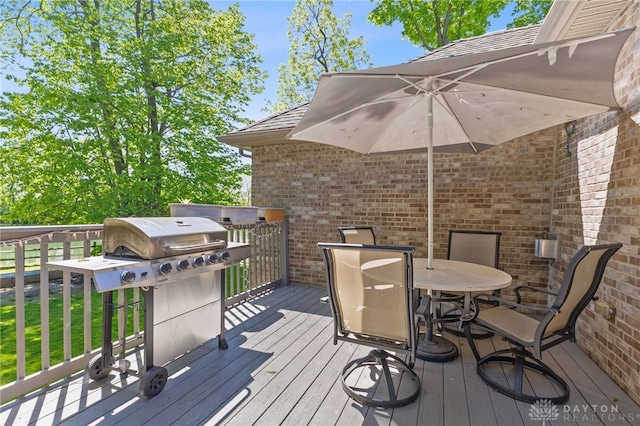 9300 Somerset Ct, Clearcreek Twp, OH 45458 - wooden deck featuring grilling area and outdoor dining area