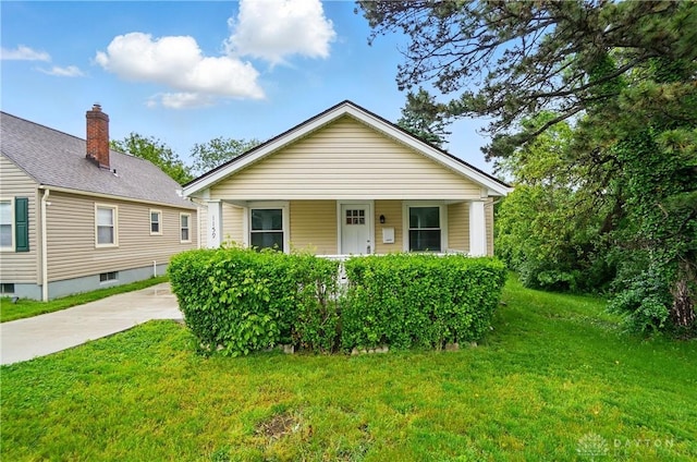 1159 E Dorothy Ln, Dayton, OH 45419 - view of front of house with a front lawn and covered porch