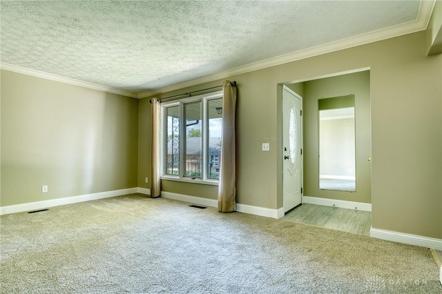 3339 Turner Dr, Springfield, OH 45504 - carpeted empty room with ornamental molding, baseboards, and a textured ceiling
