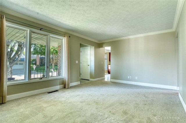 3339 Turner Dr, Springfield, OH 45504 - empty room featuring carpet, a textured ceiling, ornamental molding, and baseboards