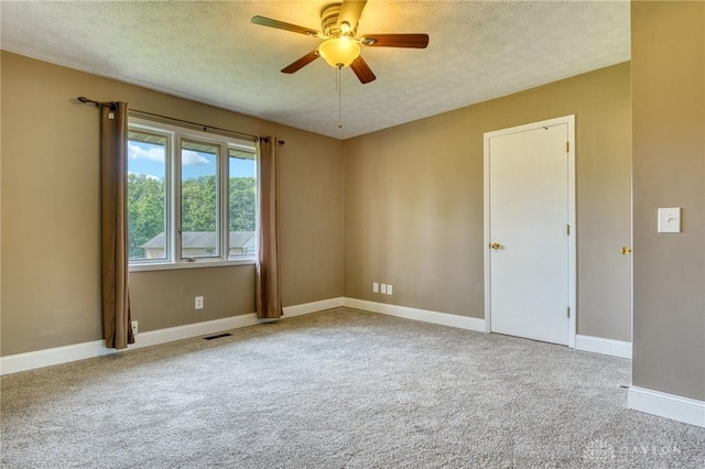 3339 Turner Dr, Springfield, OH 45504 - carpeted spare room featuring a textured ceiling, ceiling fan, and baseboards