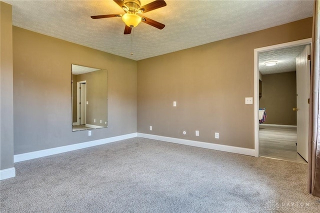 3339 Turner Dr, Springfield, OH 45504 - spare room featuring a textured ceiling, ceiling fan, baseboards, and carpet floors