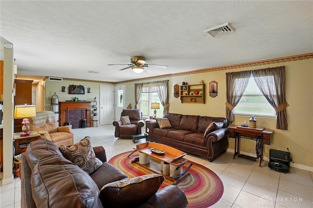 8590 Euphemia Castine Rd, Lewisburg, OH 45338 - living area with plenty of natural light, a ceiling fan, light tile patterned flooring, and crown molding