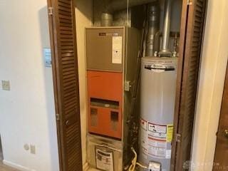 3100 Valerie Arms Dr, Harrison Twp, OH 45405 - utility room with gas water heater