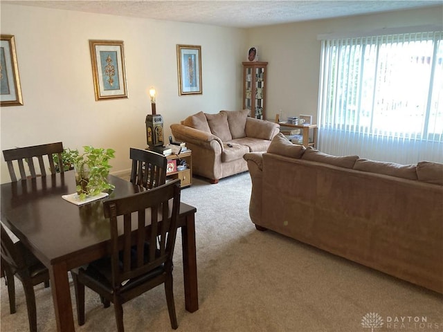 3100 Valerie Arms Dr, Harrison Twp, OH 45405 - dining area featuring light carpet