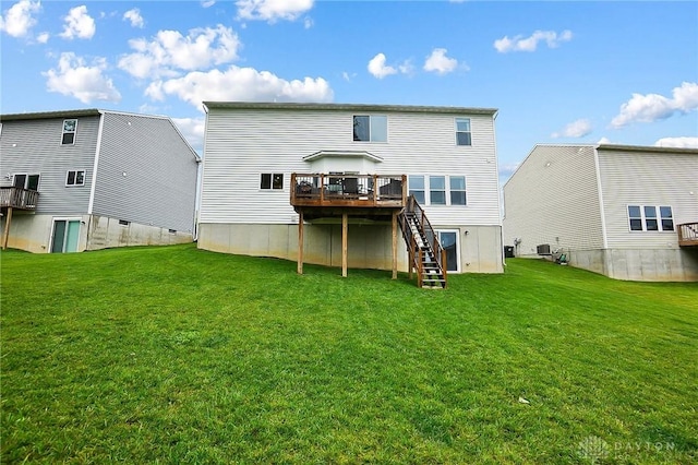 1691 Arden Bnd, Fairborn, OH 45324 - back of property with stairway, a wooden deck, a yard, and cooling unit