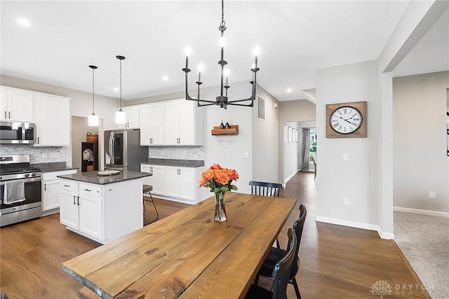 1691 Arden Bnd, Fairborn, OH 45324 - dining room featuring ceiling fan, baseboards, recessed lighting, and dark wood-style floors