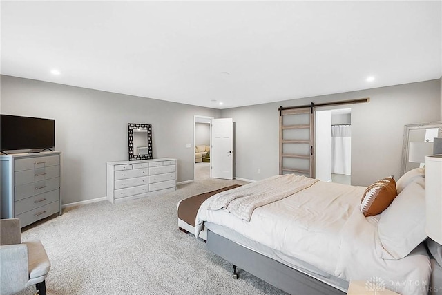 1691 Arden Bnd, Fairborn, OH 45324 - carpeted bedroom featuring a barn door, recessed lighting, and baseboards