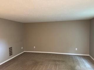 765 Clareridge Ln, Dayton, OH 45458 - empty room featuring baseboards and dark carpet