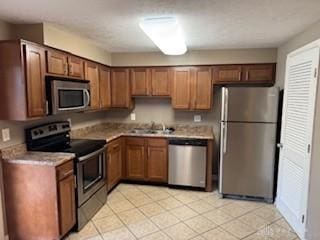 765 Clareridge Ln, Dayton, OH 45458 - kitchen featuring stainless steel appliances and light countertops