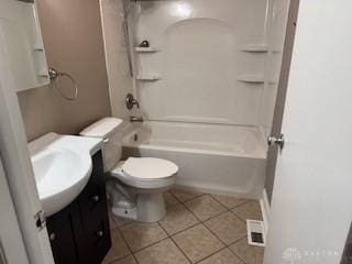 765 Clareridge Ln, Dayton, OH 45458 - bathroom with vanity, tile patterned floors, bathtub / shower combination, and toilet