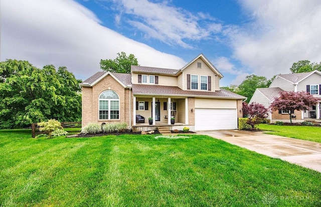 406 Forge Dr, Lebanon, OH 45036 - traditional-style home with a porch, an attached garage, driveway, and a front lawn
