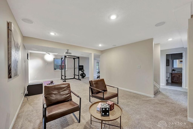 406 Forge Dr, Lebanon, OH 45036 - living area featuring light colored carpet, baseboards, and recessed lighting