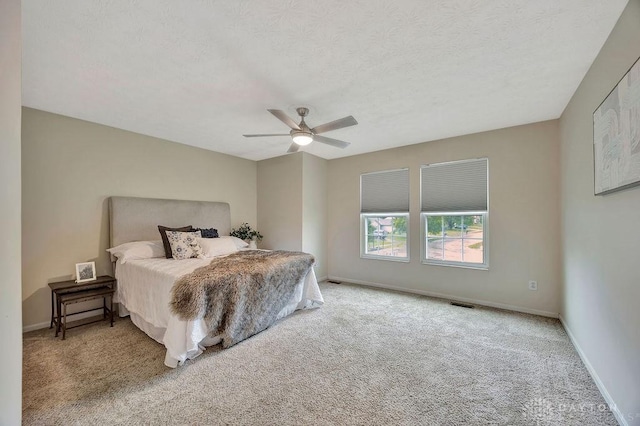 406 Forge Dr, Lebanon, OH 45036 - bedroom featuring carpet floors, baseboards, a ceiling fan, and a textured ceiling