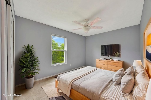 406 Forge Dr, Lebanon, OH 45036 - bedroom featuring carpet, baseboards, and ceiling fan
