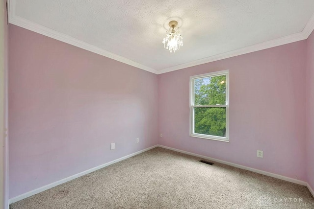 406 Forge Dr, Lebanon, OH 45036 - unfurnished room featuring light carpet, baseboards, crown molding, and a chandelier