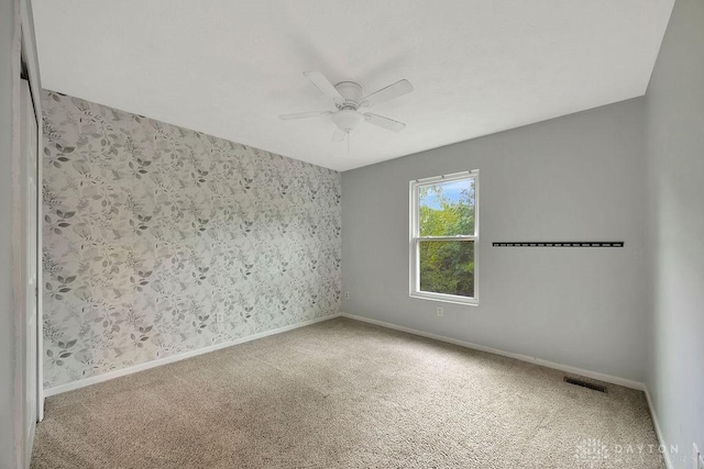 406 Forge Dr, Lebanon, OH 45036 - carpeted spare room featuring a ceiling fan and baseboards