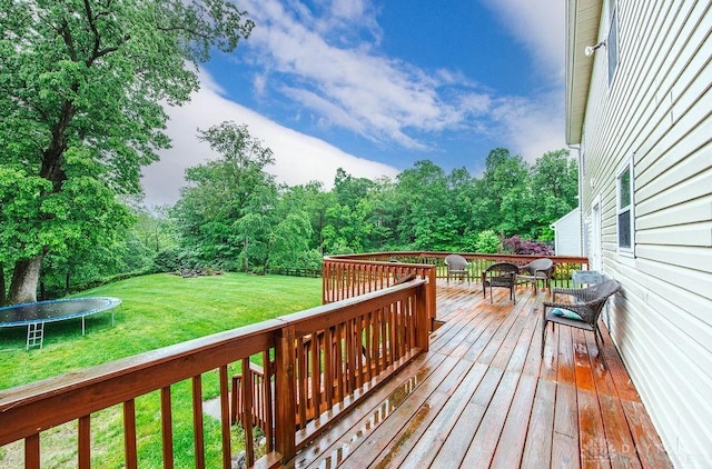 406 Forge Dr, Lebanon, OH 45036 - wooden terrace with a trampoline and a yard