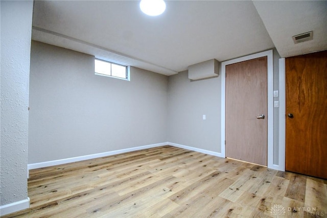 3653 Cloverdale Rd, Medway, OH 45341 - below grade area featuring wood finished floors and baseboards