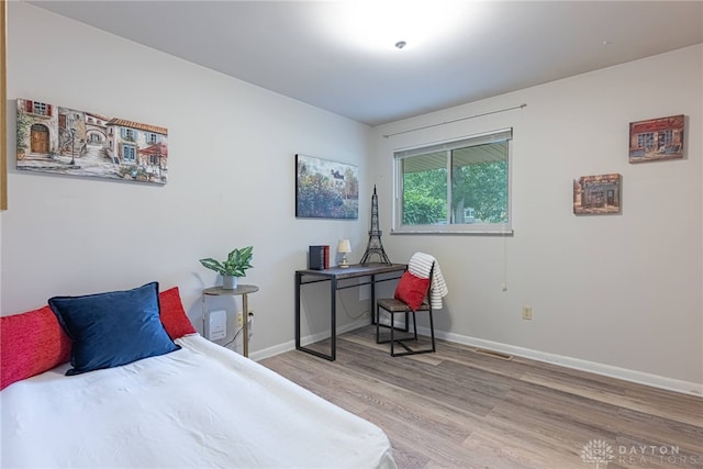 2444 Tennyson Dr, Bellbrook, OH 45305 - bedroom with light wood-type flooring and baseboards