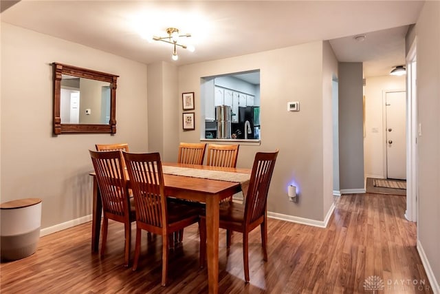 9492 Colegate Way, West Chester, OH 45011 - dining room featuring baseboards and wood finished floors