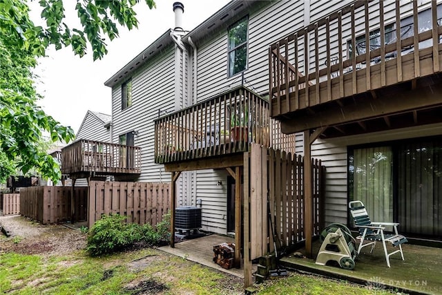 9492 Colegate Way, West Chester, OH 45011 - rear view of house with a wooden deck, central AC, and stairway