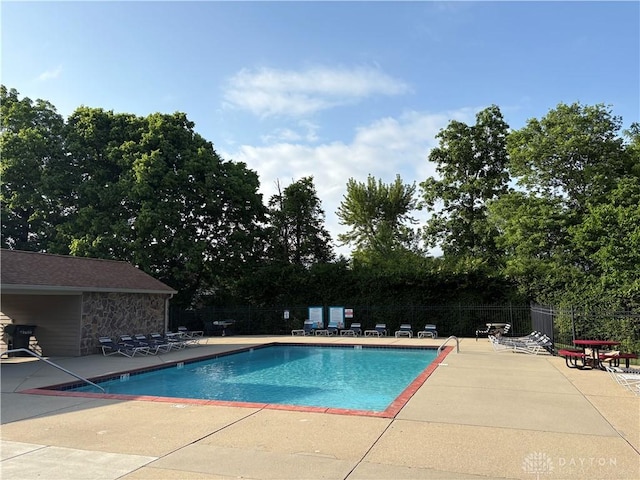 9492 Colegate Way, West Chester, OH 45011 - community pool featuring a patio area and view of scattered trees