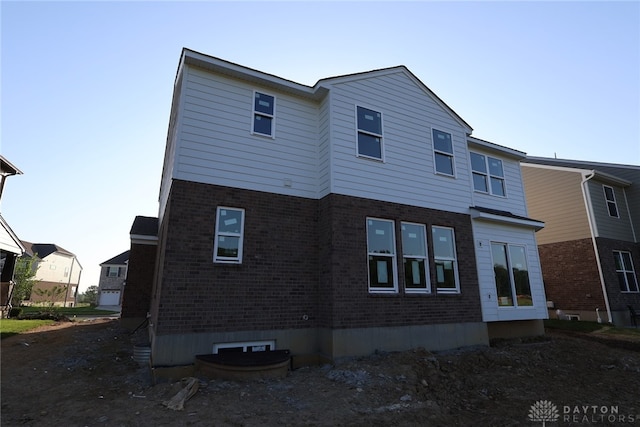 2847 Sky Crossing Dr Unit 0048, Beavercreek, OH 45434 - back of house with brick siding