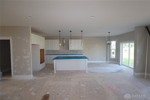 2847 Sky Crossing Dr Unit 0048, Beavercreek, OH 45434 - kitchen with white cabinets, a kitchen island, hanging light fixtures, and recessed lighting