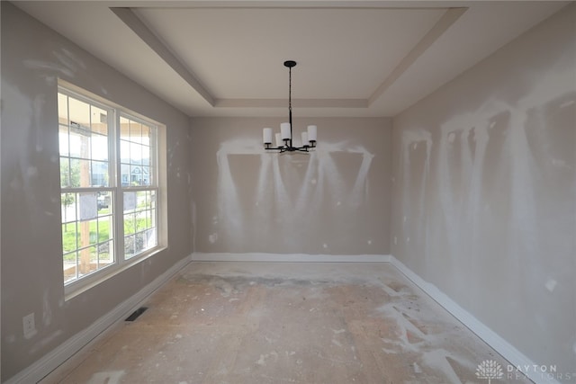 2847 Sky Crossing Dr Unit 0048, Beavercreek, OH 45434 - unfurnished dining area featuring a chandelier and a tray ceiling