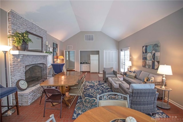 40 Nicholson Ct, Washington Twp, OH 45459 - living area with a brick fireplace, baseboards, and high vaulted ceiling