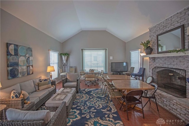 40 Nicholson Ct, Washington Twp, OH 45459 - living room with lofted ceiling and a brick fireplace