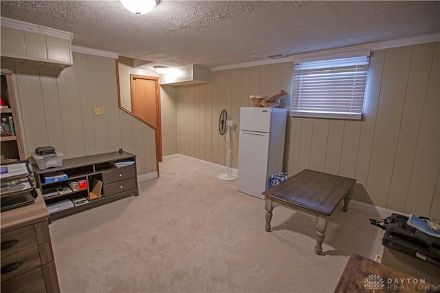 40 Nicholson Ct, Washington Twp, OH 45459 - finished basement featuring freestanding refrigerator, a textured ceiling, and light carpet