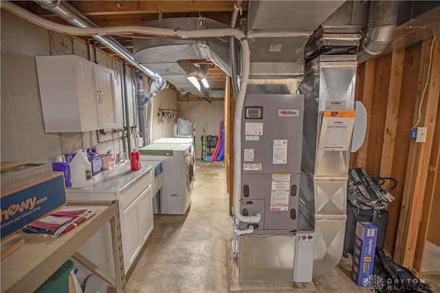 40 Nicholson Ct, Washington Twp, OH 45459 - utility room featuring washing machine and dryer