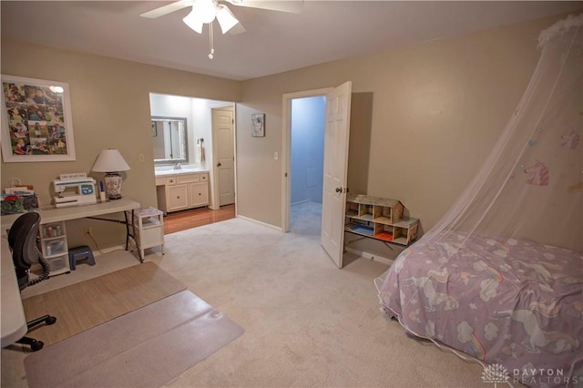 40 Nicholson Ct, Washington Twp, OH 45459 - bedroom featuring light colored carpet, a sink, baseboards, a desk, and a ceiling fan
