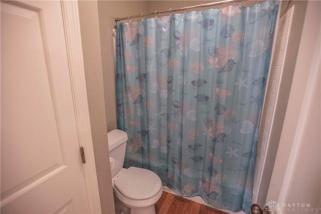 40 Nicholson Ct, Washington Twp, OH 45459 - full bath featuring toilet, wood finished floors, and a shower with curtain