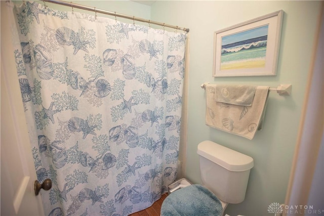 40 Nicholson Ct, Washington Twp, OH 45459 - bathroom with toilet, curtained shower, and wood finished floors