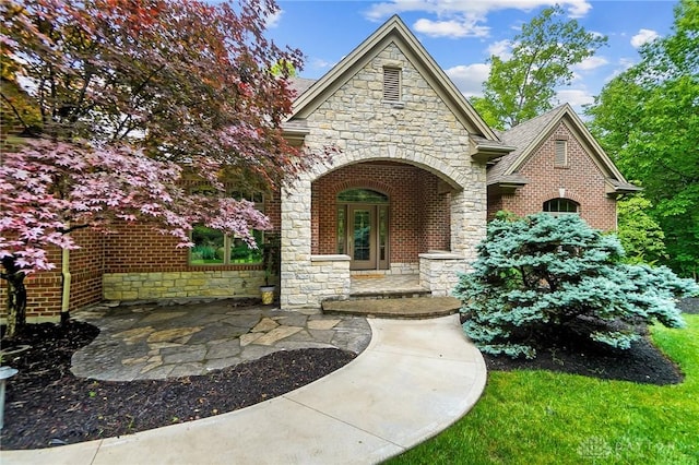 7721 Country Brook Ct, Springboro, OH 45066 - view of front of home with stone siding and brick siding