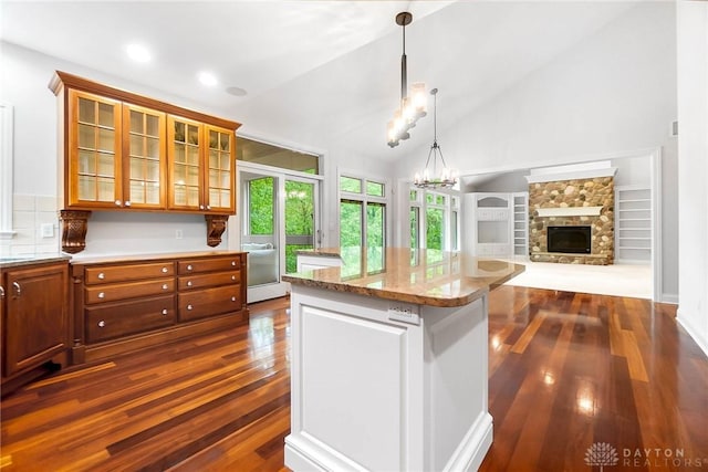 7721 Country Brook Ct, Springboro, OH 45066 - kitchen featuring dark wood finished floors, a chandelier, a center island, healthy amount of natural light, and recessed lighting