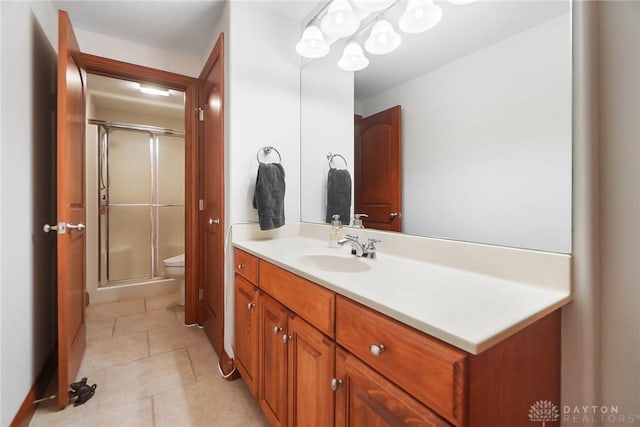 7721 Country Brook Ct, Springboro, OH 45066 - full bath with toilet, vanity, a shower stall, and tile patterned flooring
