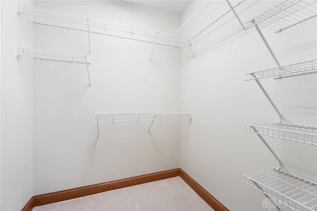 7721 Country Brook Ct, Springboro, OH 45066 - spacious closet featuring carpet floors