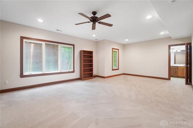 7721 Country Brook Ct, Springboro, OH 45066 - spare room with light carpet, baseboards, a ceiling fan, and recessed lighting