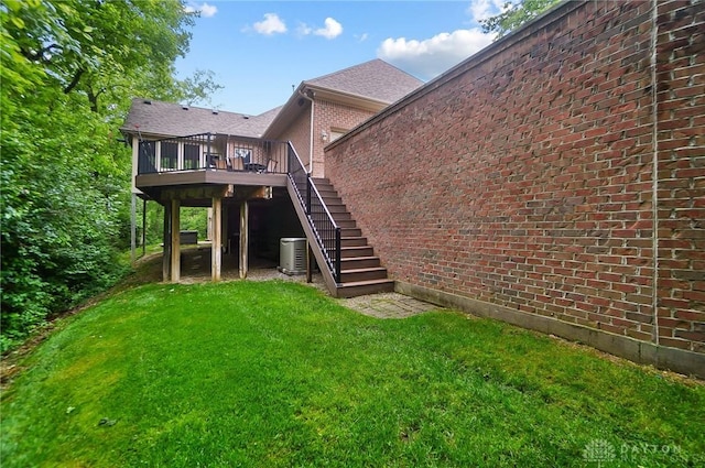 7721 Country Brook Ct, Springboro, OH 45066 - back of property featuring central air condition unit, a deck, stairs, a yard, and brick siding