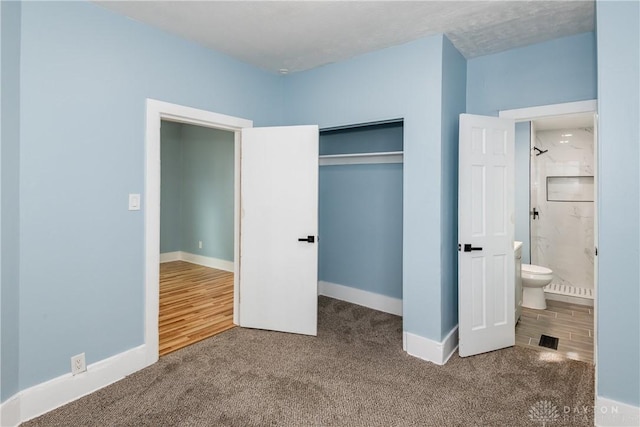 1015 Maiden Ln, Springfield, OH 45504 - unfurnished bedroom with carpet floors, baseboards, and a closet
