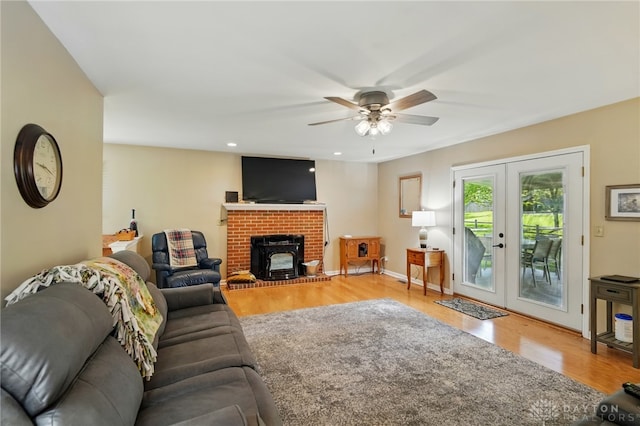 601 Tara Oaks Dr, Middletown, OH 45042 - living room with light wood-type flooring, french doors, a ceiling fan, recessed lighting, and baseboards