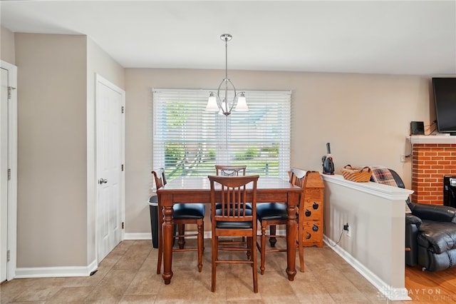 601 Tara Oaks Dr, Middletown, OH 45042 - dining room featuring baseboards and a chandelier