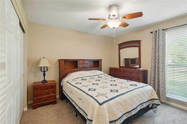601 Tara Oaks Dr, Middletown, OH 45042 - carpeted bedroom with a closet, baseboards, and a ceiling fan