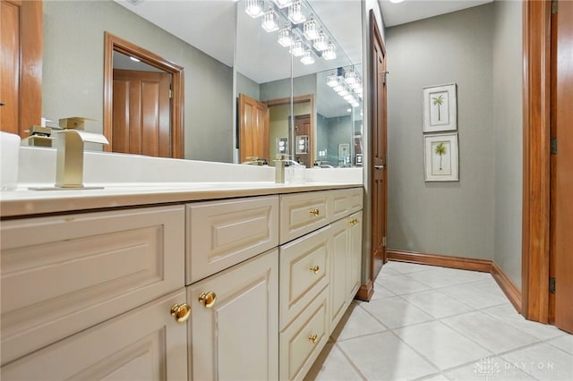 1129 Green Tree Rd, Centerville, OH 45429 - full bath featuring double vanity, baseboards, and tile patterned flooring
