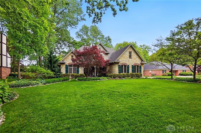 1129 Green Tree Rd, Centerville, OH 45429 - view of front of house with stone siding and a front yard