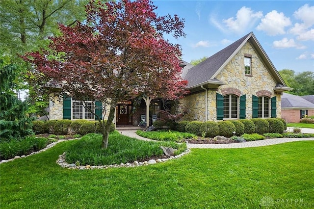1129 Green Tree Rd, Centerville, OH 45429 - view of front of property with stone siding and a front lawn